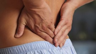 Discomfort in the lower back with low back osteochondrosis